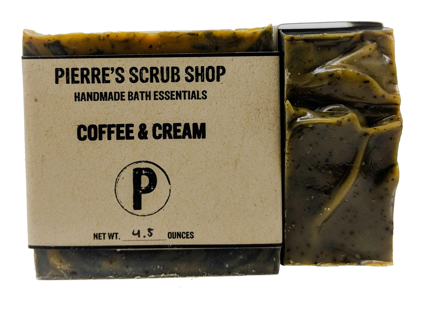 A Coffee & Cream bar in its kraft paper wrapper beside an unwrapped dark brown bar